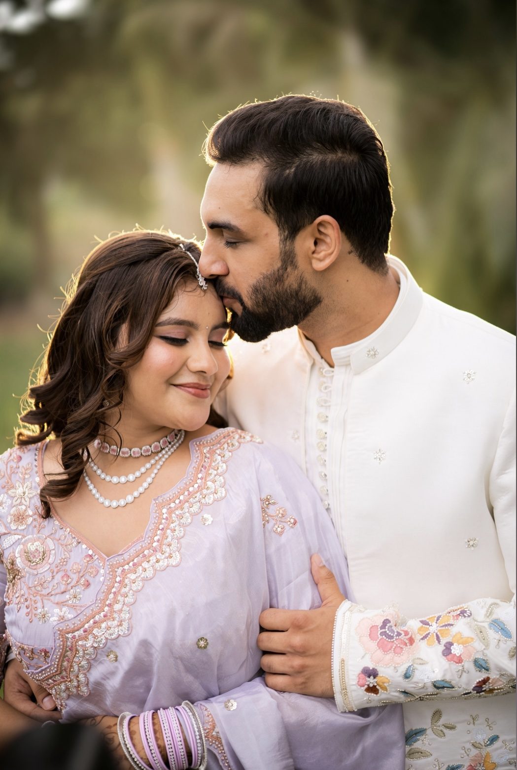 Darpan kisses Helly's forehead at golden hour